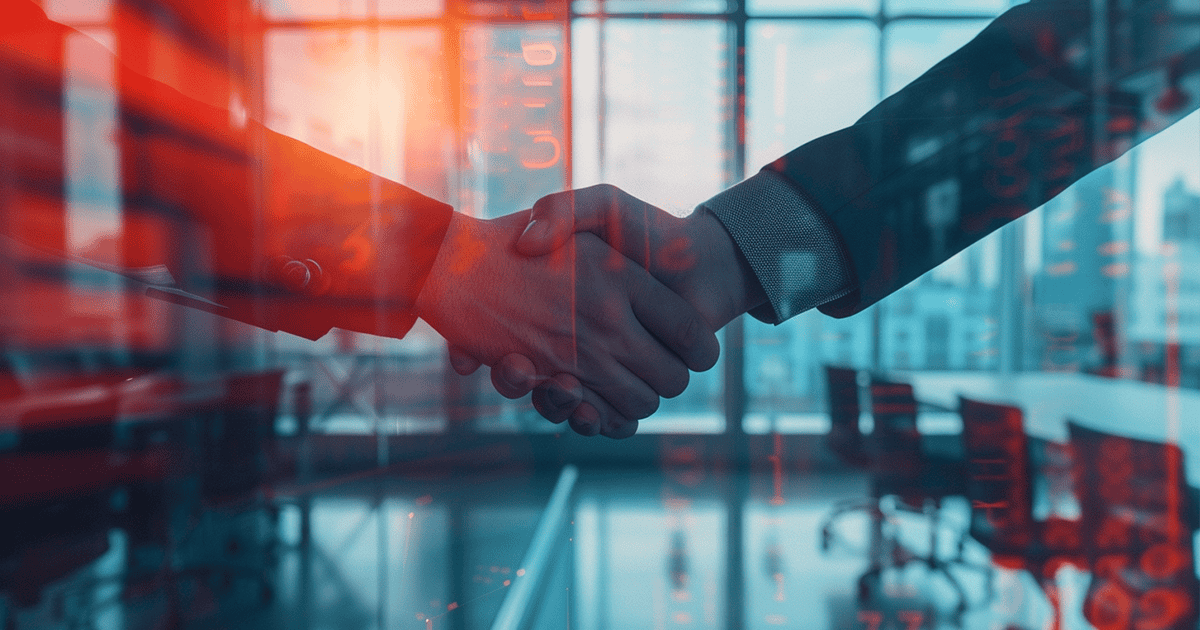 Business partnership handshake representing trust built by exceeding service agreement boundaries